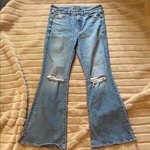 Women's Blue Distressed Flare Jeans